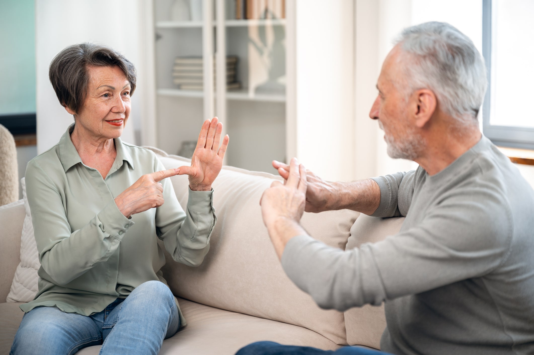 people communicating with sign language