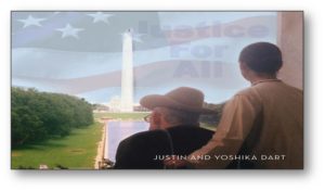 Image of Justin Dart, Jr. and his wife Yoshika Dart as taken from the rear, viewing the Washington Memorial and reflecting pool from the Lincoln Memorial.